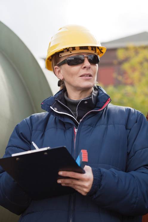 A woman wearing a hard hat.