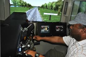 A conductor using a train simulator.